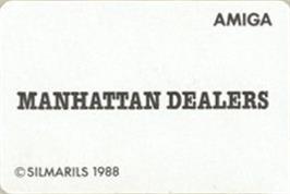 Top of cartridge artwork for Manhattan Dealers on the Commodore Amiga.