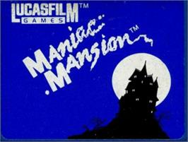 Top of cartridge artwork for Maniac Mansion on the Commodore Amiga.