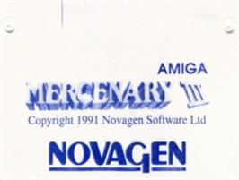 Top of cartridge artwork for Mercenary 3 - The Dion Crisis on the Commodore Amiga.