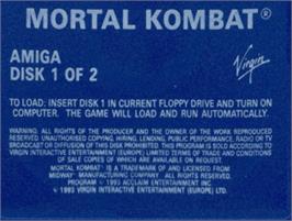 Top of cartridge artwork for Mortal Kombat on the Commodore Amiga.