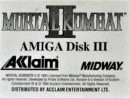 Top of cartridge artwork for Mortal Kombat II on the Commodore Amiga.