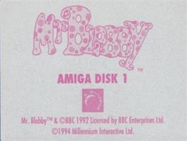 Top of cartridge artwork for Mr. Blobby on the Commodore Amiga.