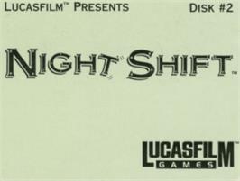 Top of cartridge artwork for Night Shift on the Commodore Amiga.