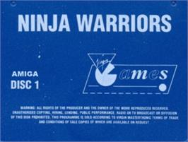 Top of cartridge artwork for Ninja Warriors, The on the Commodore Amiga.