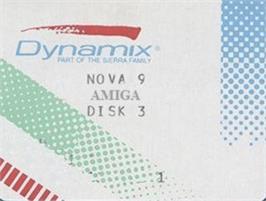 Top of cartridge artwork for Nova 9 - The Return Of Gir Draxon on the Commodore Amiga.