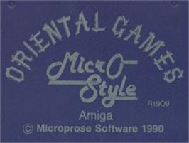 Top of cartridge artwork for Oriental Games on the Commodore Amiga.