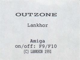 Top of cartridge artwork for Outzone on the Commodore Amiga.