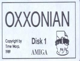 Top of cartridge artwork for Oxxonian on the Commodore Amiga.
