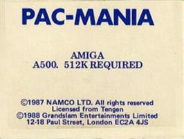 Top of cartridge artwork for Pac-Mania on the Commodore Amiga.