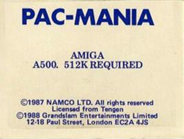 Top of cartridge artwork for Pac-mania on the Commodore Amiga.