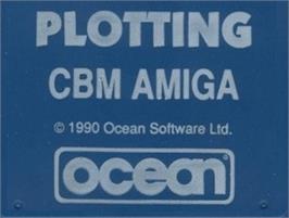 Top of cartridge artwork for Plotting on the Commodore Amiga.