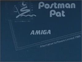 Top of cartridge artwork for Postman Pat on the Commodore Amiga.