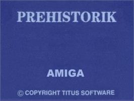 Top of cartridge artwork for Prehistorik on the Commodore Amiga.