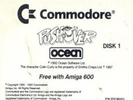Top of cartridge artwork for Push-over on the Commodore Amiga.