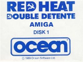 Top of cartridge artwork for Red Heat on the Commodore Amiga.