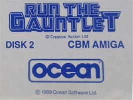 Top of cartridge artwork for Run the Gauntlet on the Commodore Amiga.