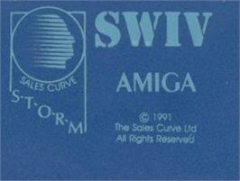 Top of cartridge artwork for SWIV on the Commodore Amiga.