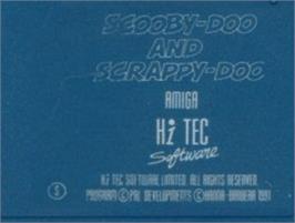 Top of cartridge artwork for Scooby-doo And Scrappy-doo on the Commodore Amiga.