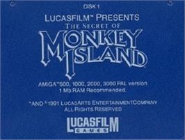 Top of cartridge artwork for Secret of Monkey Island on the Commodore Amiga.