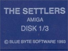 Top of cartridge artwork for Settlers, The on the Commodore Amiga.