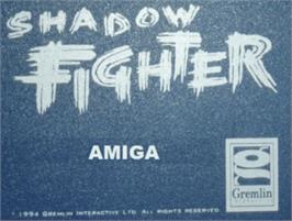 Top of cartridge artwork for Shadow Fighter on the Commodore Amiga.
