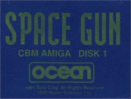 Top of cartridge artwork for Space Gun on the Commodore Amiga.