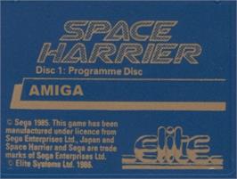 Top of cartridge artwork for Space Harrier on the Commodore Amiga.