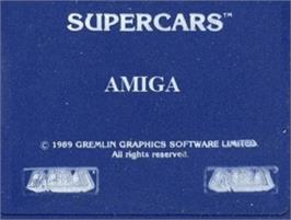 Top of cartridge artwork for Super Cars on the Commodore Amiga.