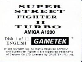 Top of cartridge artwork for Super Street Fighter II Turbo on the Commodore Amiga.
