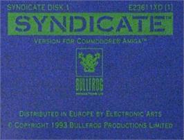Top of cartridge artwork for Syndicate: American Revolt on the Commodore Amiga.