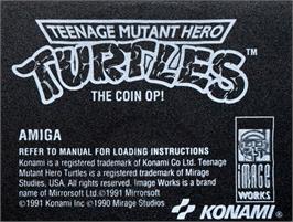 Top of cartridge artwork for Teenage Mutant Hero Turtles - The Coin-op! on the Commodore Amiga.