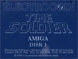 Top of cartridge artwork for Time Soldier on the Commodore Amiga.
