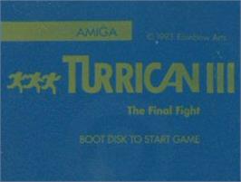Top of cartridge artwork for Turrican 3 on the Commodore Amiga.