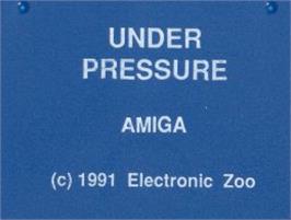 Top of cartridge artwork for Under Pressure on the Commodore Amiga.