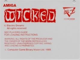 Top of cartridge artwork for Wicked on the Commodore Amiga.