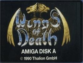 Top of cartridge artwork for Wings Of Death on the Commodore Amiga.