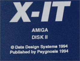 Top of cartridge artwork for X-It on the Commodore Amiga.
