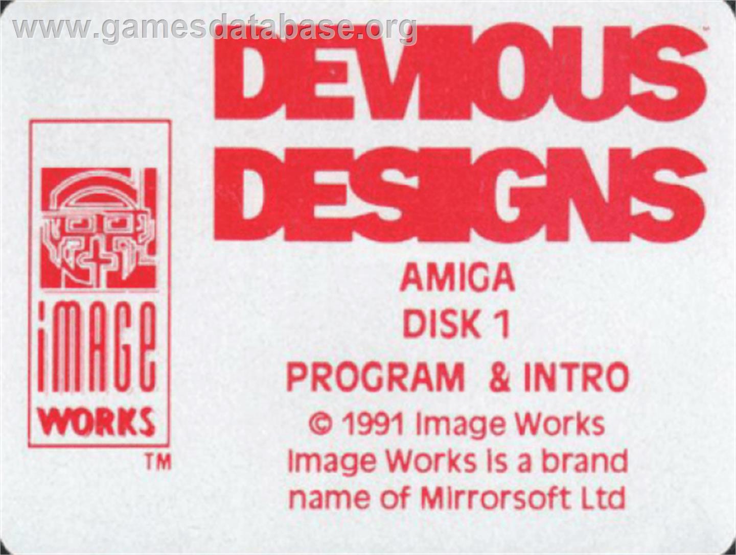 Devious Designs - Commodore Amiga - Artwork - Cartridge Top