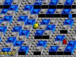 In game image of Pac-mania on the Commodore Amiga.