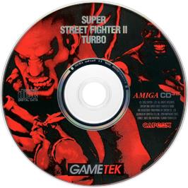 Artwork on the Disc for Super Street Fighter 2 Turbo on the Commodore Amiga CD32.