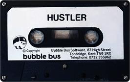 Cartridge artwork for Hustler on the Commodore Plus 4.