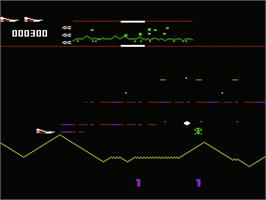 In game image of Defender on the Commodore VIC-20.