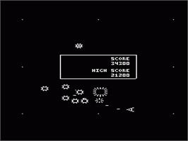In game image of Omega Race on the Commodore VIC-20.