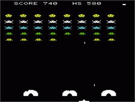 In game image of Space Invaders on the Commodore VIC-20.