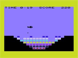 In game image of Valley Bomber on the Commodore VIC-20.