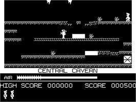 In game image of Manic Miner on the Dragon 32-64.