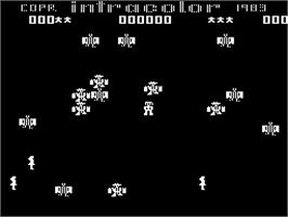 In game image of Robotron on the Dragon 32-64.