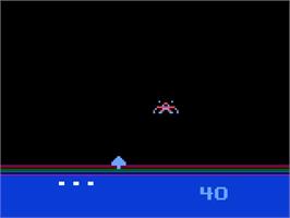 In game image of Demon Attack on the Magnavox Odyssey 2.