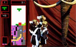 In game image of Super Tetris on the Microsoft DOS.