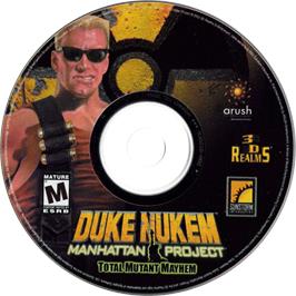 Cartridge artwork for Duke Nukem - Manhattan Project (Limited Edition) on the Microsoft Windows.